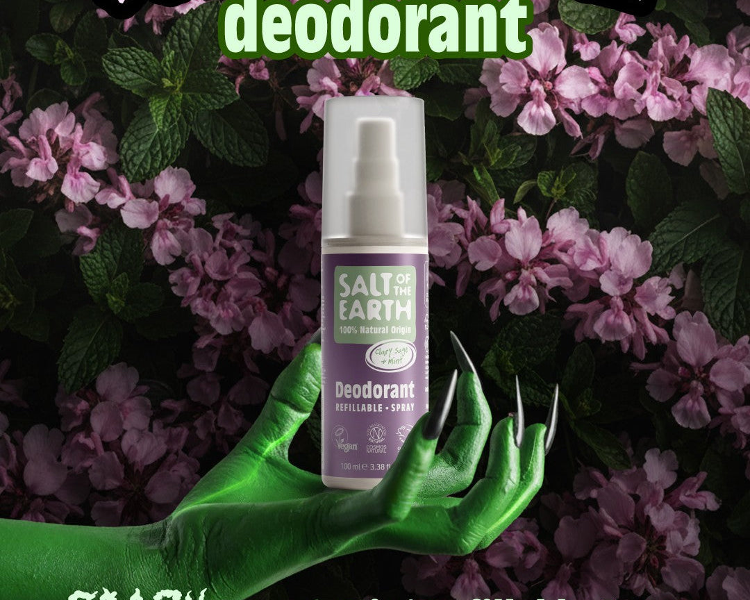 Halloween-themed image showing Salt of the Earth Sage & Mint natural refillable deodorant spray held by a green hand among purple flowers, promoting the ‘SUPERnatural’ deodorant campaign.